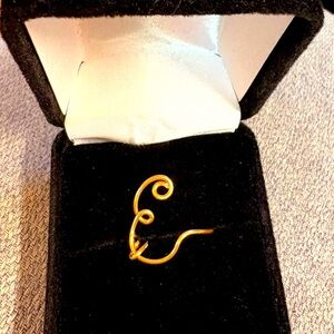 Elegant Gold E Ring